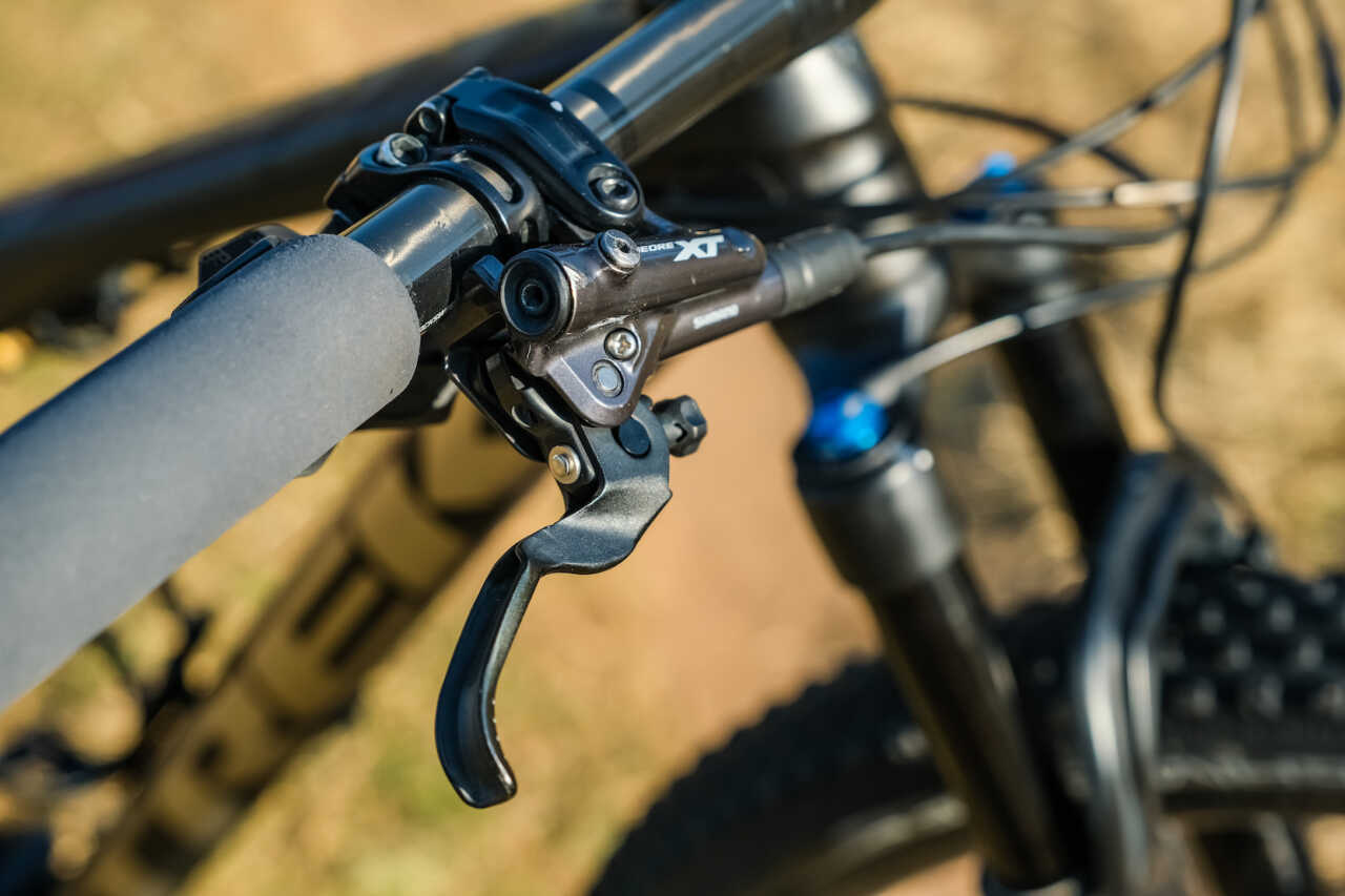 review of mountain bike racer ambrosi massimiliano trek's supercaliber bicycle on location in johannesburg south africa for bike network