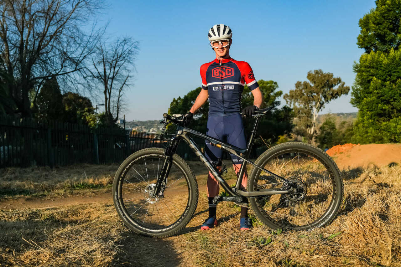 review of mountain bike racer ambrosi massimiliano trek's supercaliber bicycle on location in johannesburg south africa for bike network