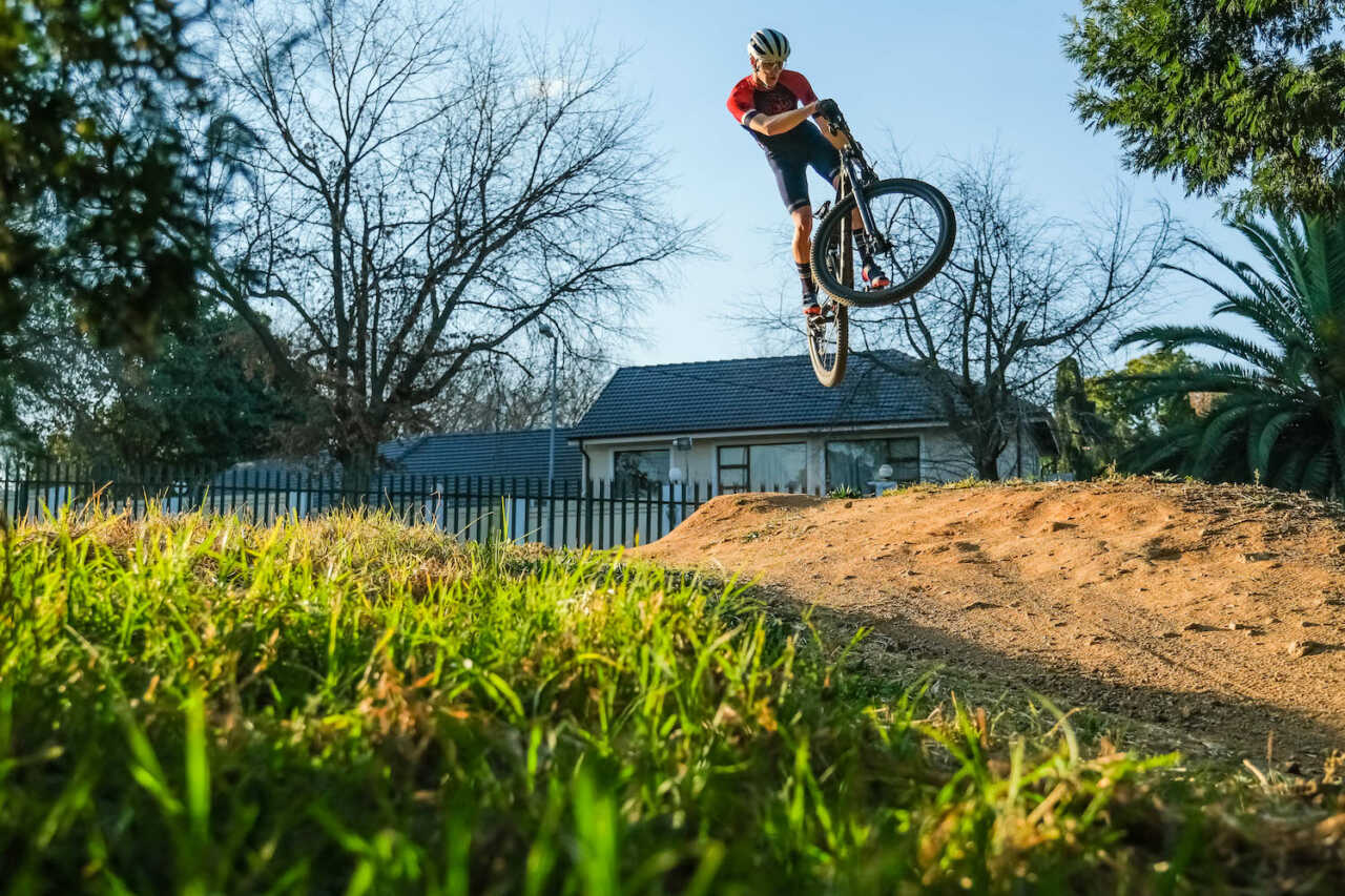 review of mountain bike racer ambrosi massimiliano trek's supercaliber bicycle on location in johannesburg south africa for bike network