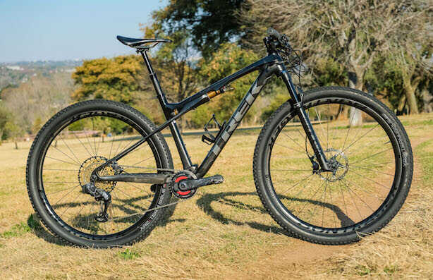 review of mountain bike racer ambrosi massimiliano trek's supercaliber bicycle on location in johannesburg south africa for bike network